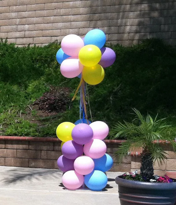 Red carpet walkway balloon towers